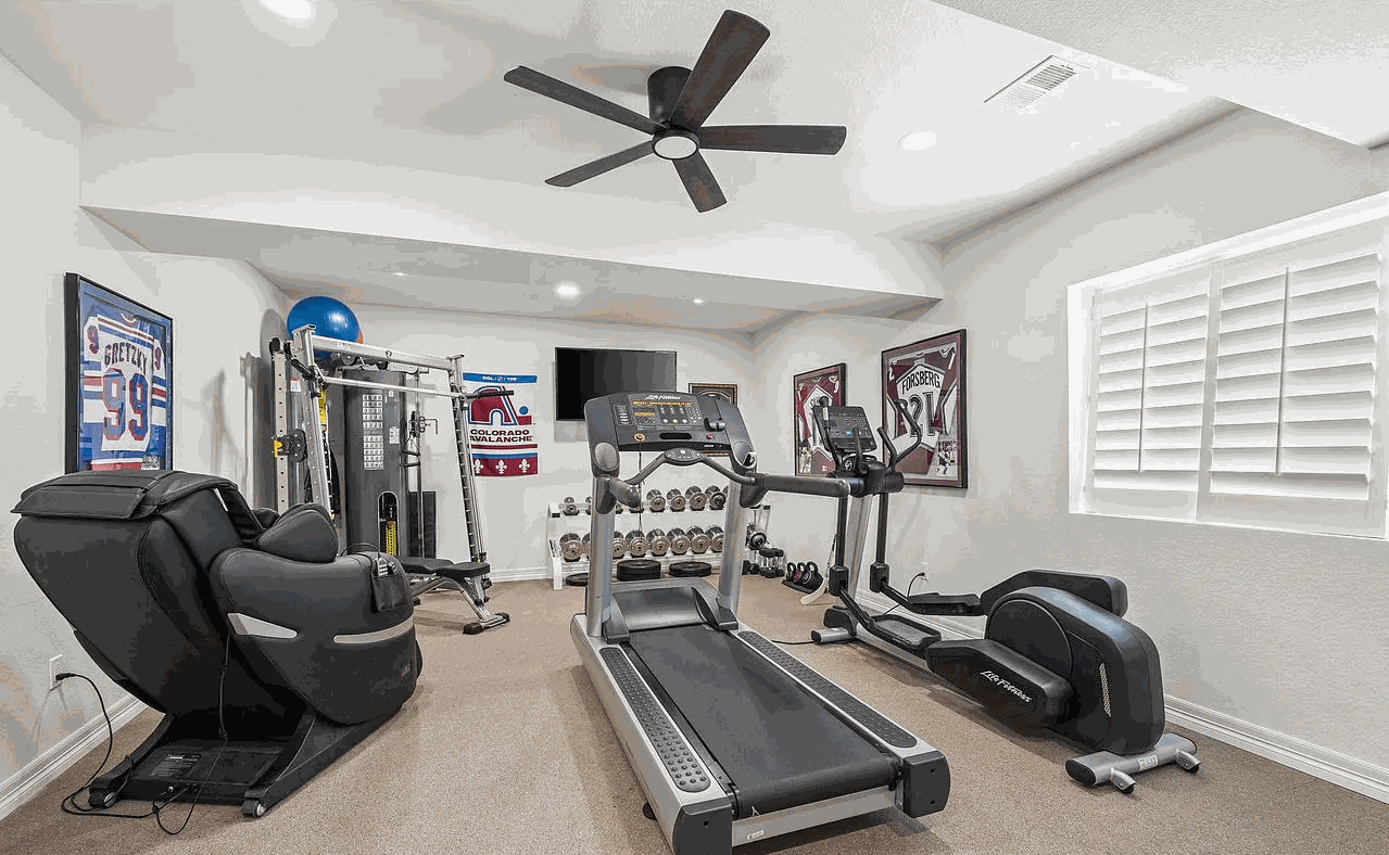 Finished basement home gym by Revive