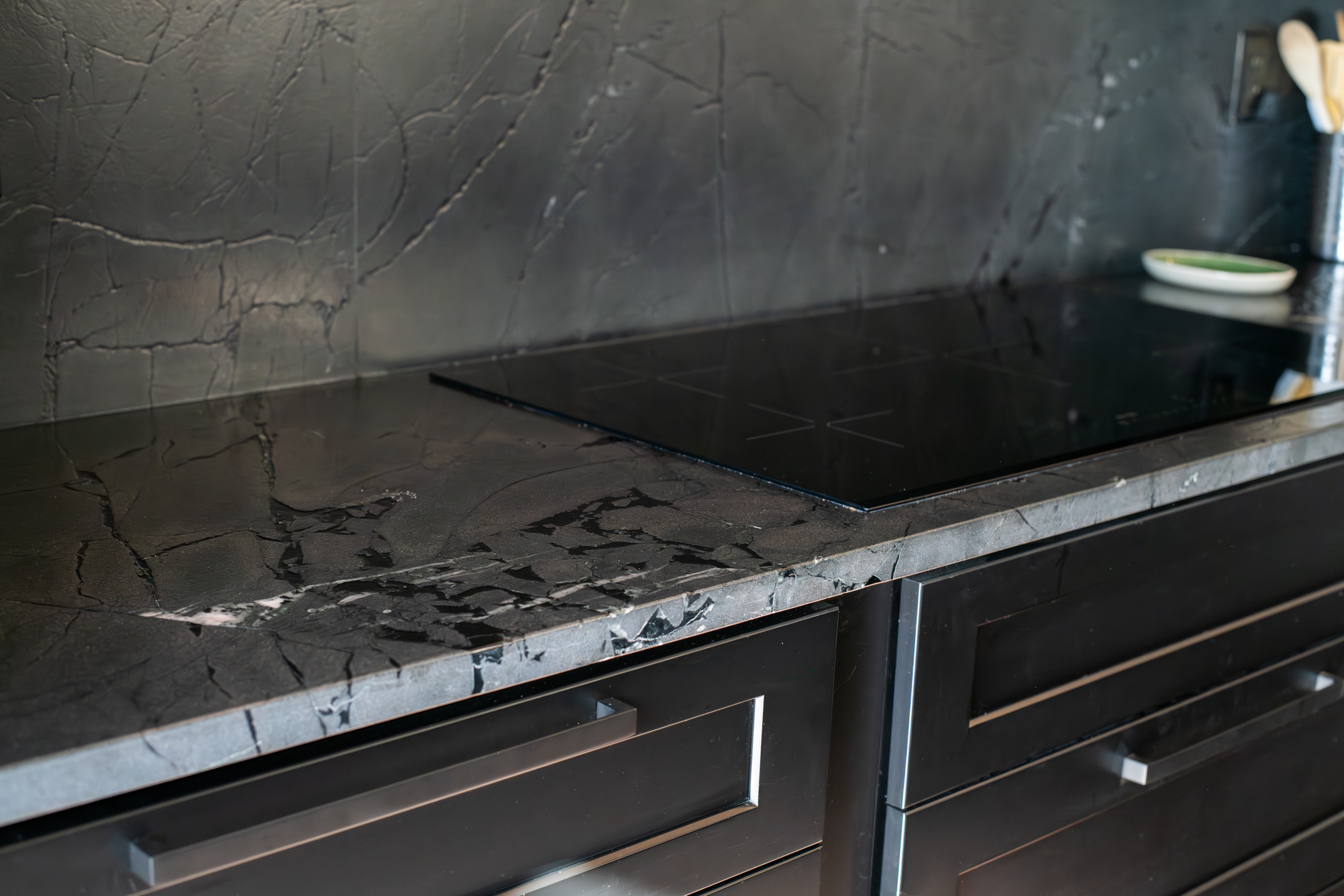 Stone countertop and cabinetry in a finished Revive kitchen
