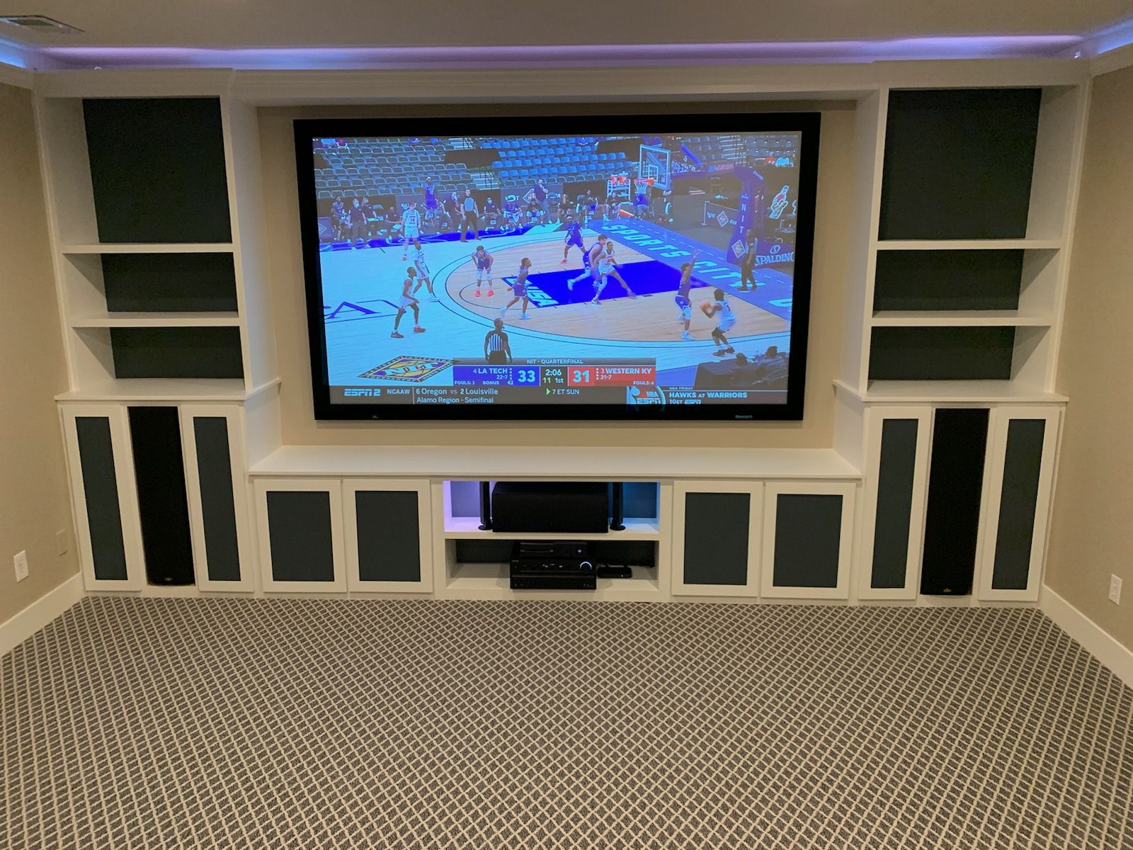 Media room built-in cabinetry by Revive