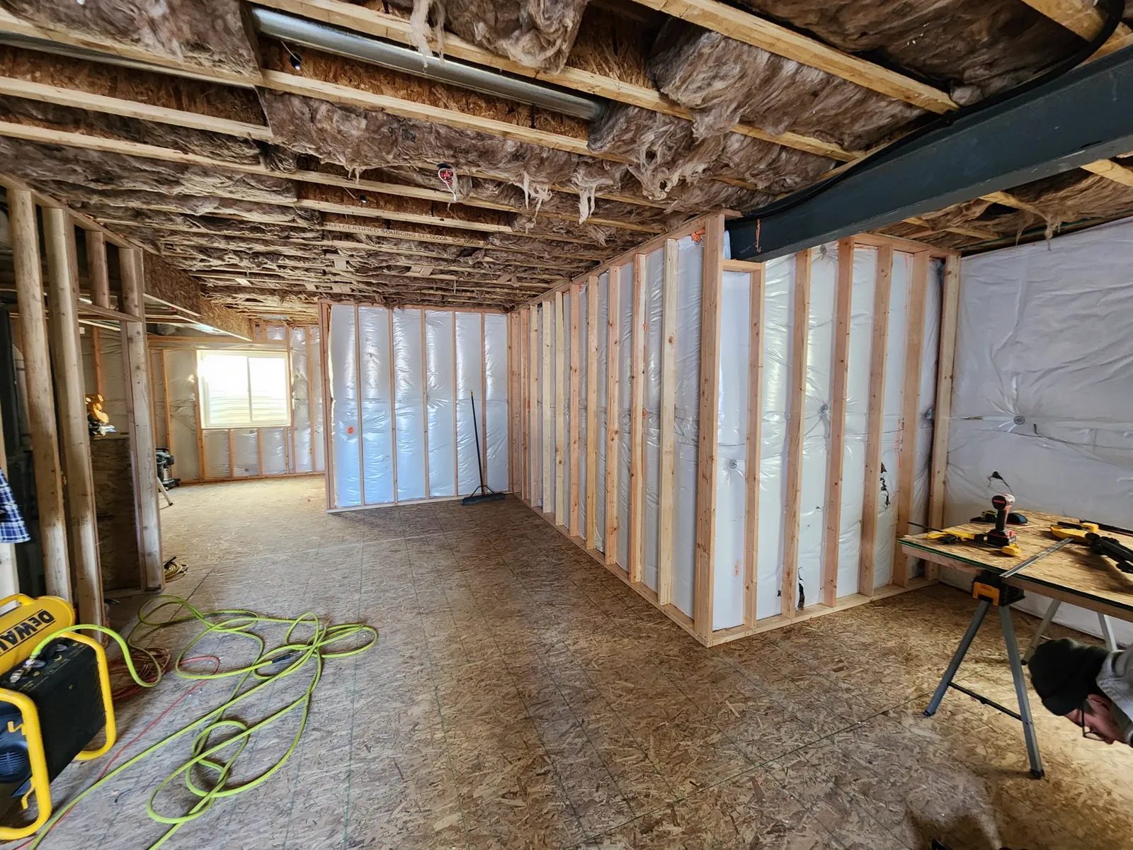 Basement finishing project in progress by Revive